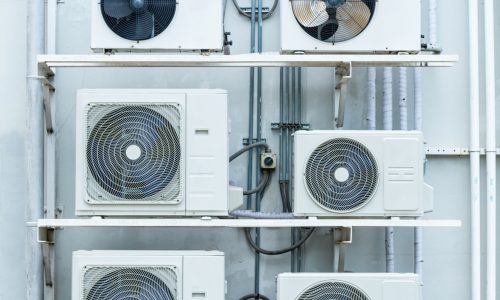 outdoor air conditioner multiple air compressors Installed outside stacked neatly for cooling